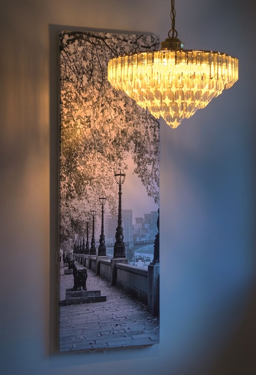 The chandelier on the landing